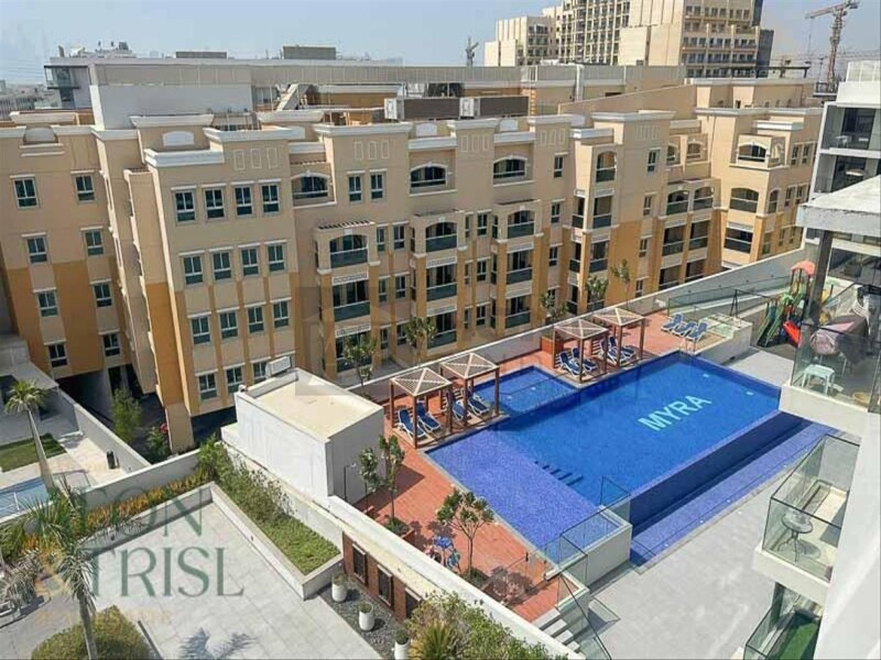 Apartment for Sale in Oxford Residence 1 - Jumeirah Village Circle, Dubai - Pool view | Furnished | Top floor at 739000 AED