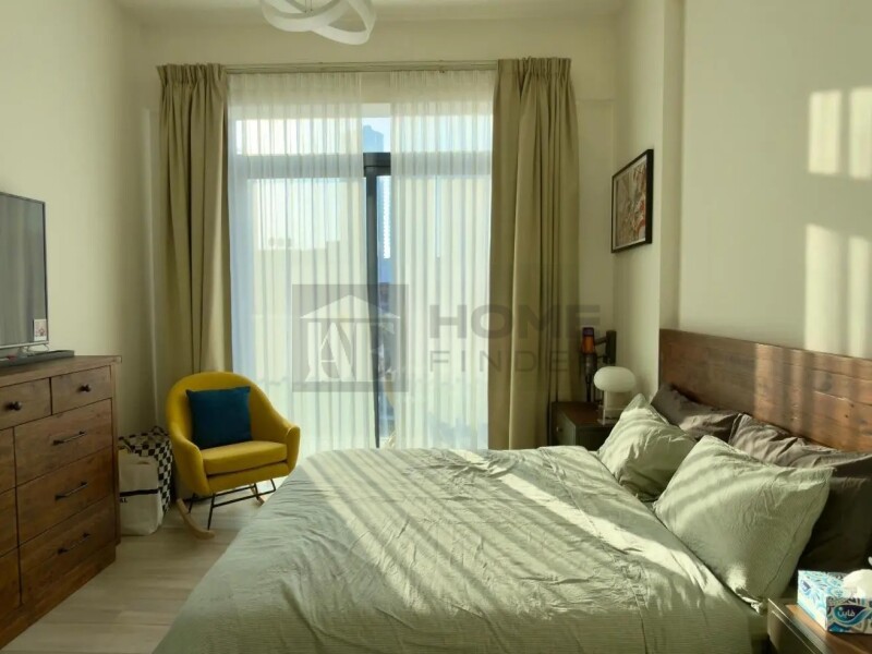 Apartment for Sale in Oxford Residence 2 - Jumeirah Village Circle, Dubai - Pool View | Sunny One-Bedroom | Fully Equipped at 1090000 AED