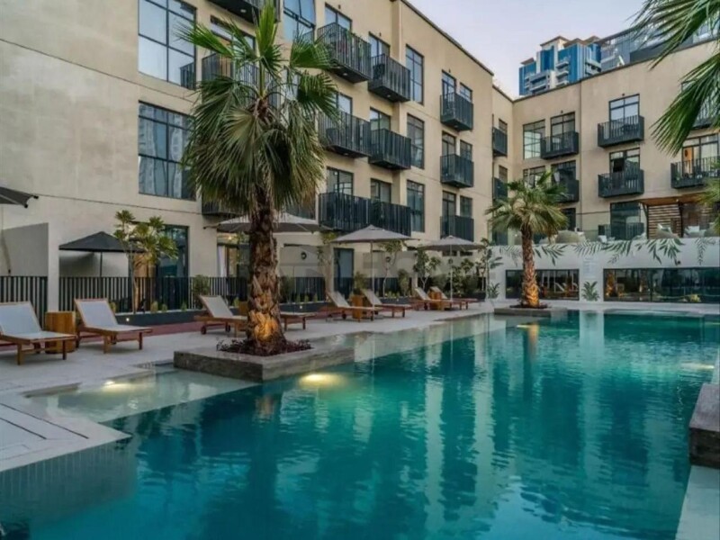 Apartment for Sale in Beverly Residence 1 - Jumeirah Village Circle, Dubai - Fully Furnished Studio | Rented Unit | High ROI at 640000 AED