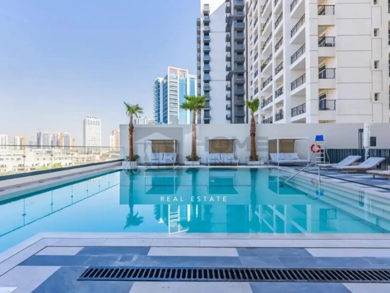 Apartment for Sale in Belgravia Heights 1 - Jumeirah Village Circle, Dubai - Pool and Amenities View | Largest 1BR| 2 Baths at 1489999 AED