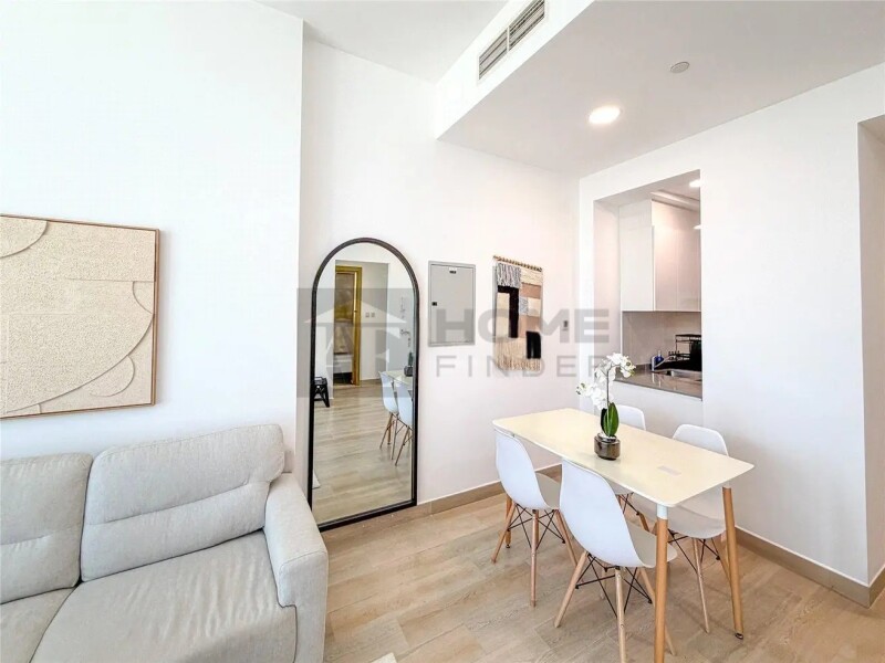 Apartment for Rent in Bloom Tower B - Jumeirah Village Circle, Dubai - Fully Furnished | 12 cheques | Balcony | Pool View at 85000 AED