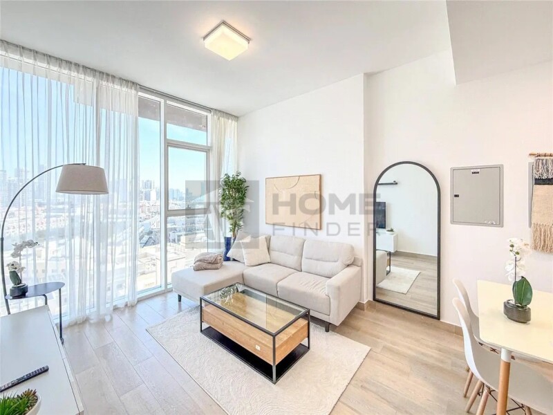 Apartment for Rent in Bloom Tower B - Jumeirah Village Circle, Dubai - Fully Furnished | 12 cheques | Balcony | Pool View at 85000 AED