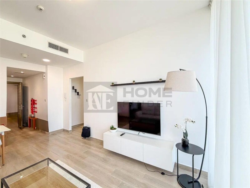 Apartment for Rent in Bloom Tower B - Jumeirah Village Circle, Dubai - Fully Furnished | Community View | Vacant at 74000 AED