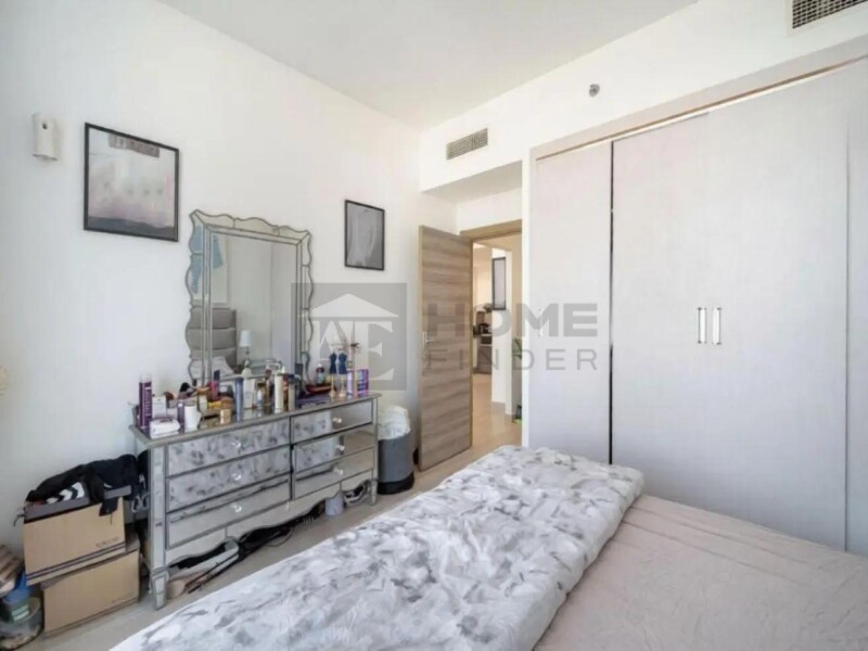Apartment for Rent in Bloom Tower B - Jumeirah Village Circle, Dubai - Fully Furnished | Community View | Vacant at 74000 AED