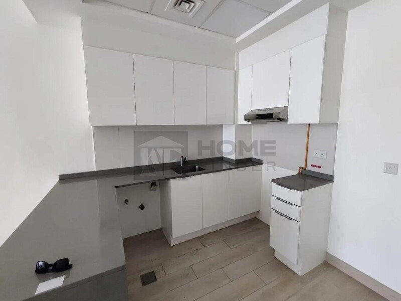 Apartment for Rent in Bloom Tower A - Jumeirah Village Circle, Dubai - Unfurnished 2BR | Prime location | Ready to move at 134999 AED