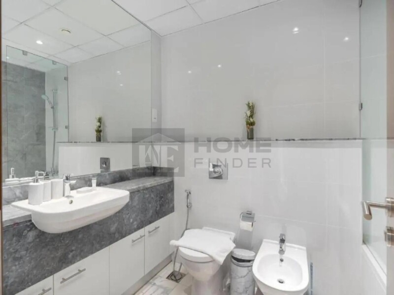 Apartment for Rent in Al Habtoor - Amna Tower, Dubai - Furnished 1BR Apartment | Canal and Downtown View at 96000 AED