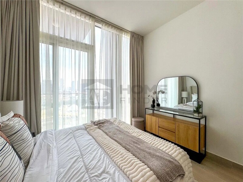 Apartment for Rent in Bloom Tower B - Jumeirah Village Circle, Dubai - Fully Furnished | 12 cheques | Balcony | Pool View at 85000 AED