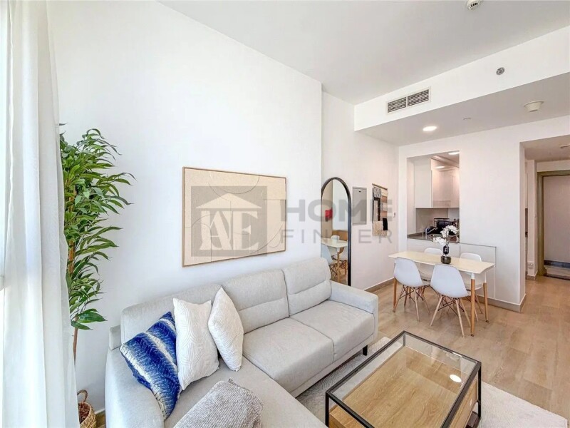 Apartment for Rent in Bloom Tower B - Jumeirah Village Circle, Dubai - Fully Furnished | 12 cheques | Balcony | Pool View at 85000 AED