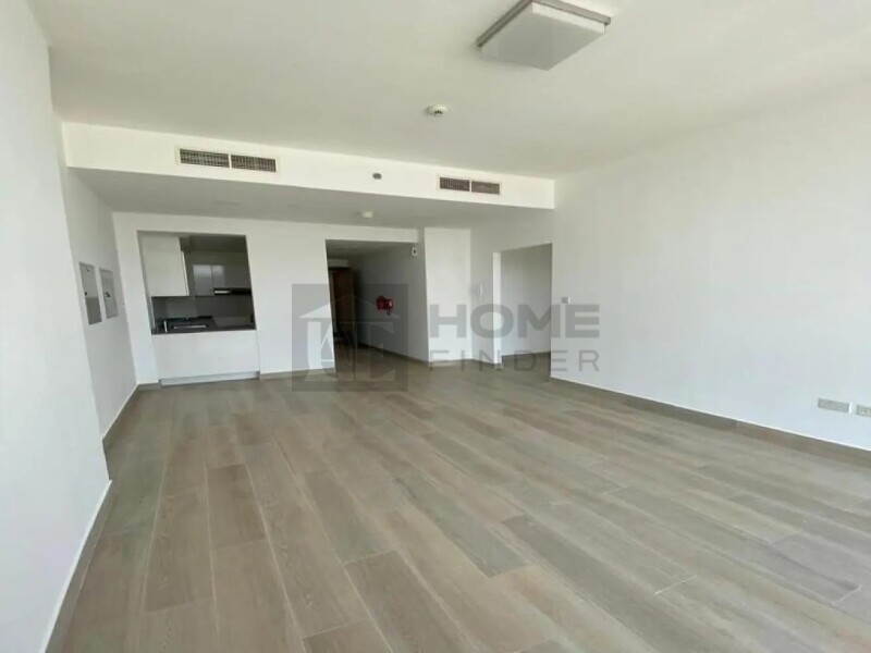 Apartment for Rent in Bloom Tower B - Jumeirah Village Circle, Dubai - Unfurnished |Prime Location |Community View at 74999 AED
